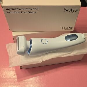 White Electric Shaver